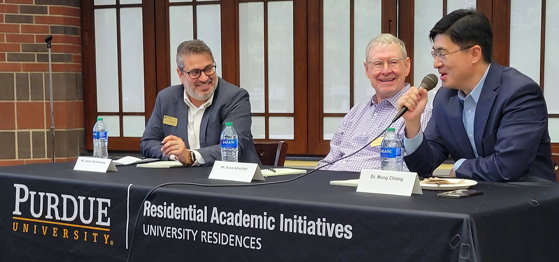 Purdue President Mung Chiang meets with Executives in Residence Jason Tennenhouse and Bruce Schechter.