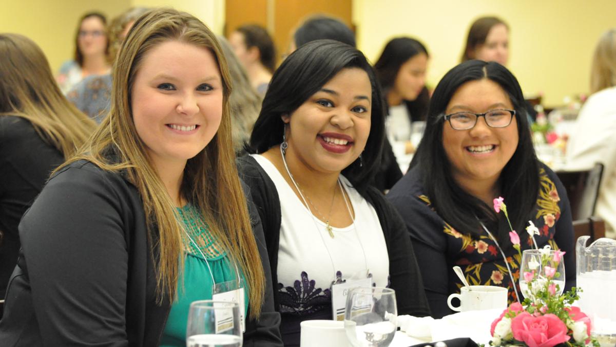 Photo of 3 students looking cheerful