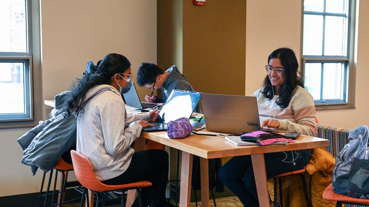 Group of students collaborating in First Street Towers residence hall