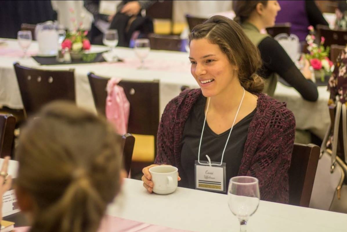 A student engaged in conversation.