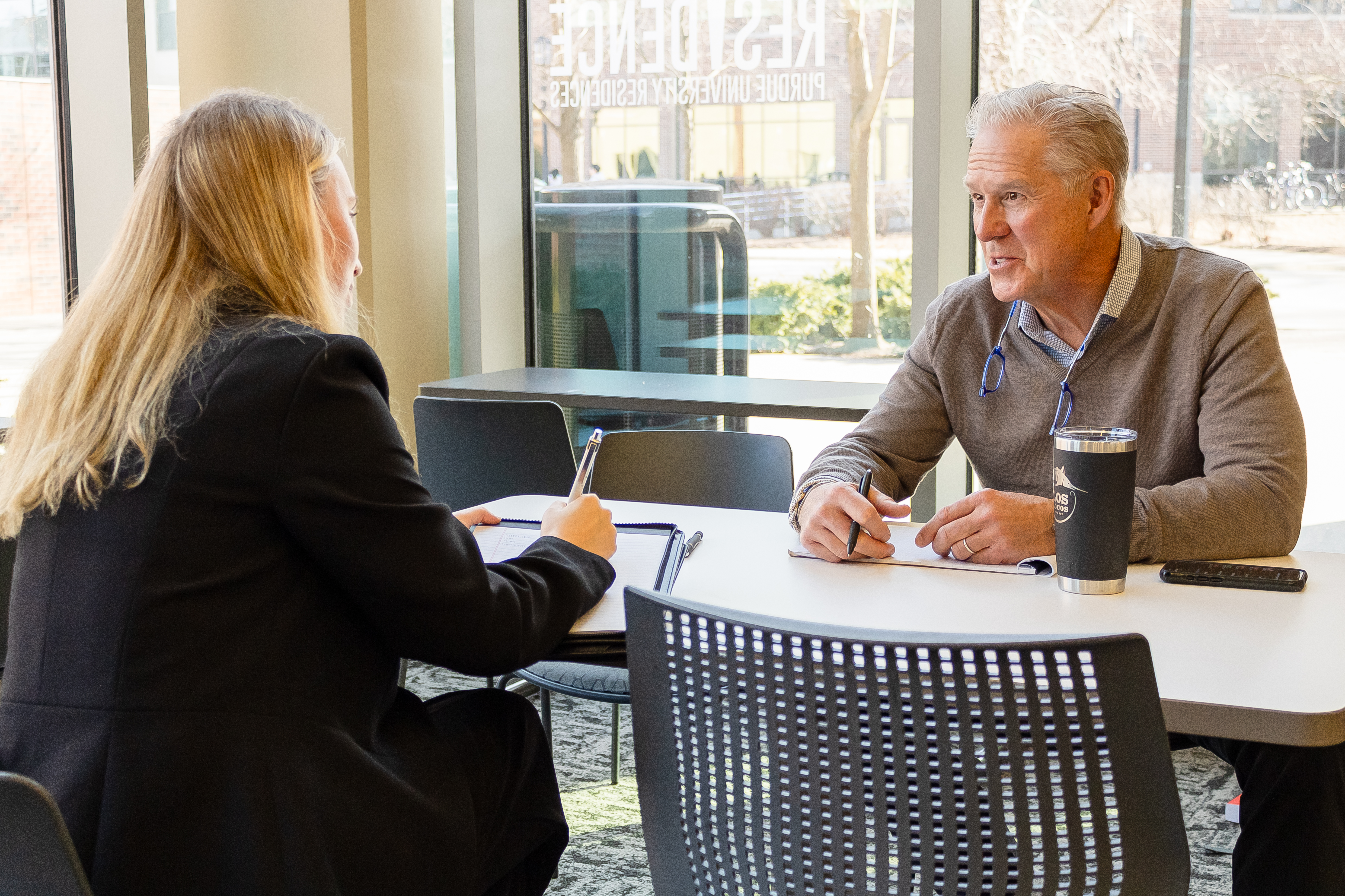 Will Sheley mentoring a student