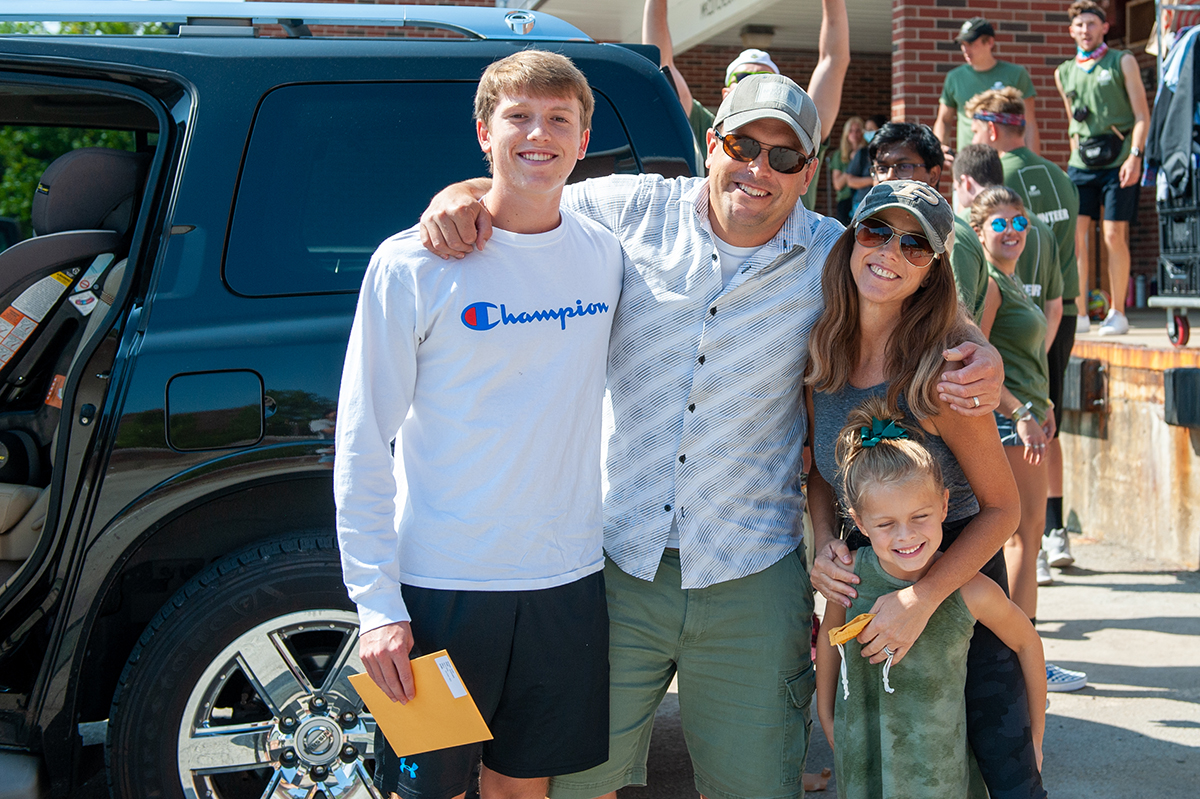 Family poses during move-in.