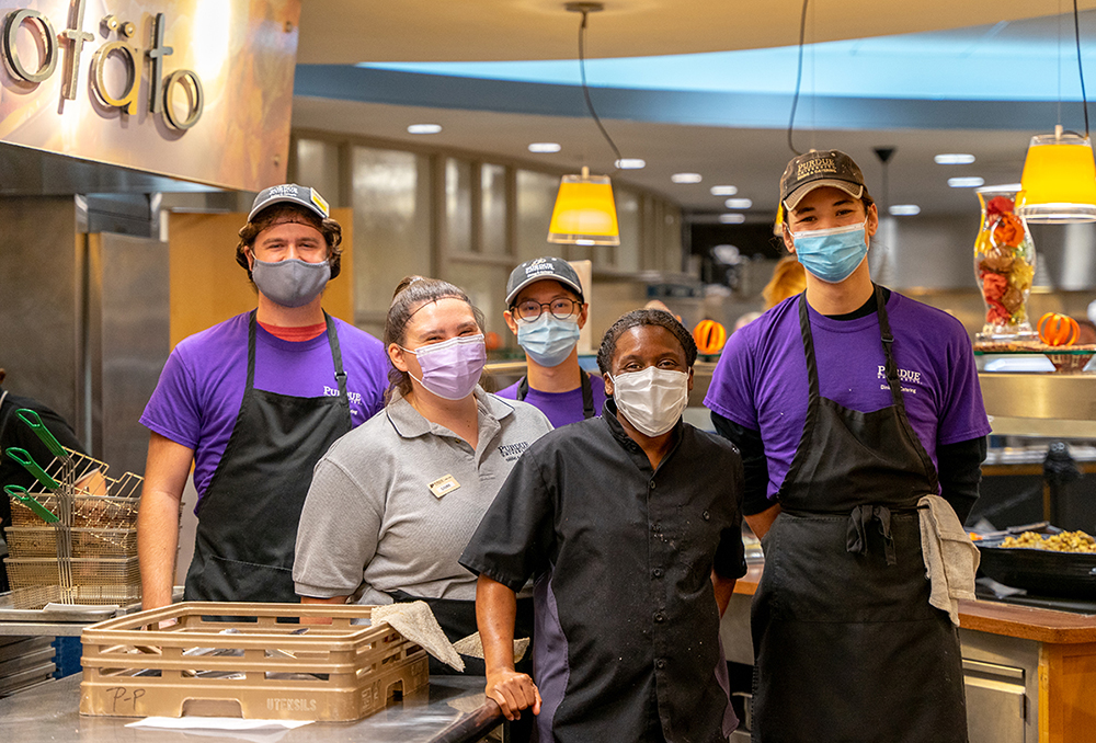 Staff at Ford Dining Court gather during their Thanksgiving dinner shift.