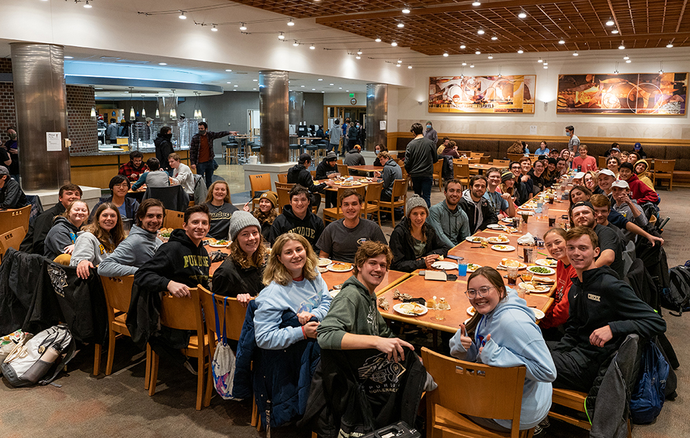 Groups of students gather for Thanksgiving dinner at Ford Dining Court.