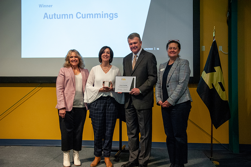 Autumn Cummings (second from left) received the inaugural Steps to Leaps Student Support Award.