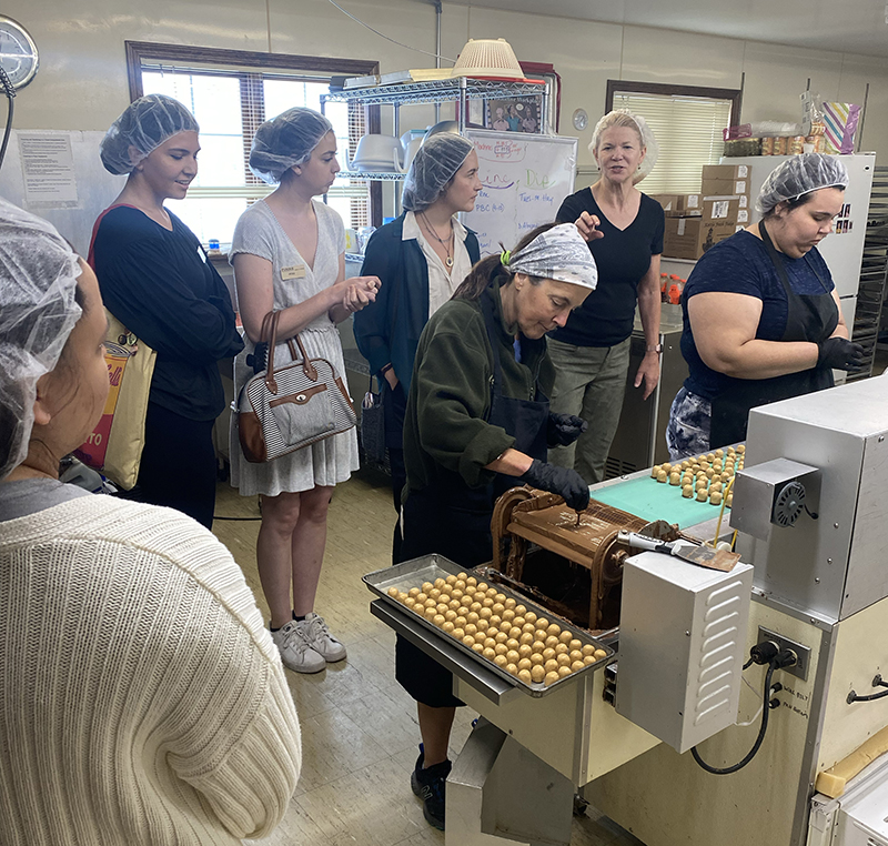 Interns tour Wolf's Fine Handmade Chocolate