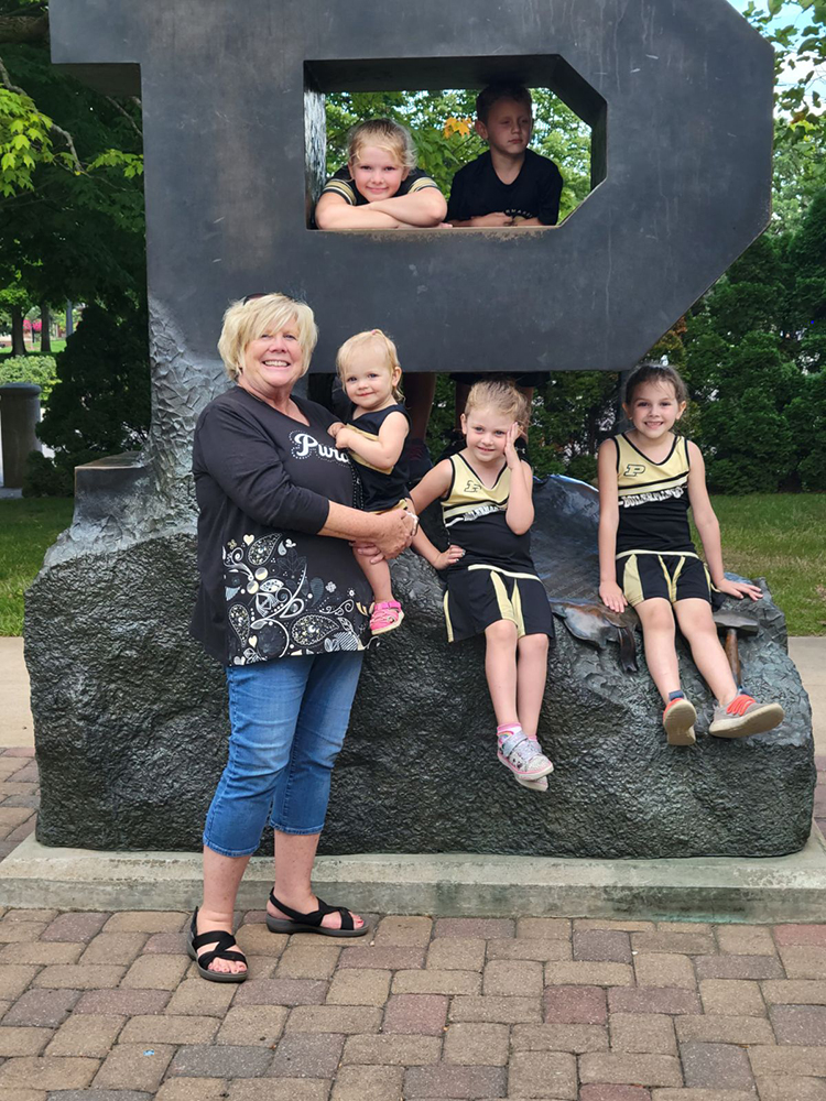 Sue Kramer with grandchildren.
