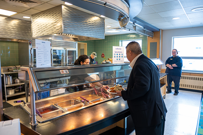 Man orders food from Infinite Solutions