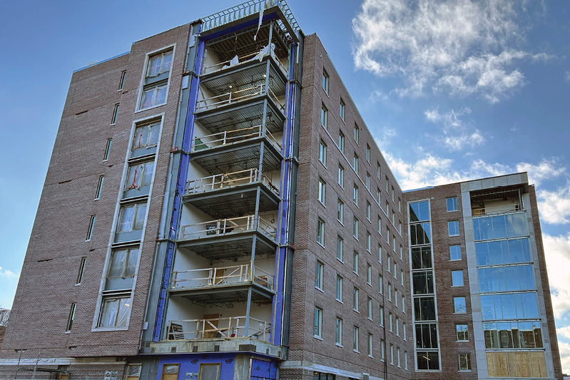 An exterior view of construction on South Hall, which rises eight stories. 
